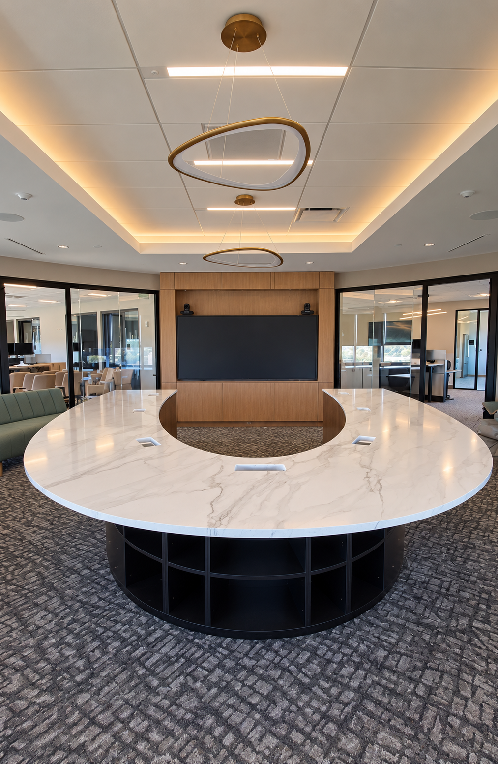 A bank meeting room with a horseshoe-shaped Vitium printed conference table, pale veining and a curved front edge.