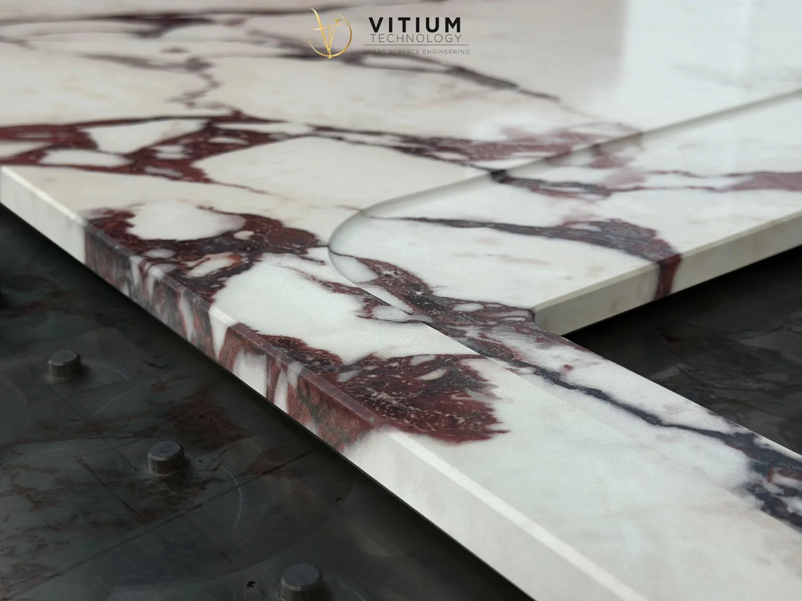 Original Vitium photograph showing burgundy veining continuing from the top onto the shaped edge.