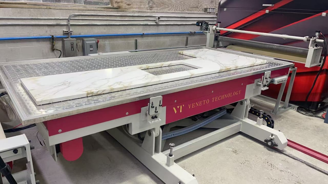 Vitium printed countertop with a sink cut-out and marble-effect veining on the production line.