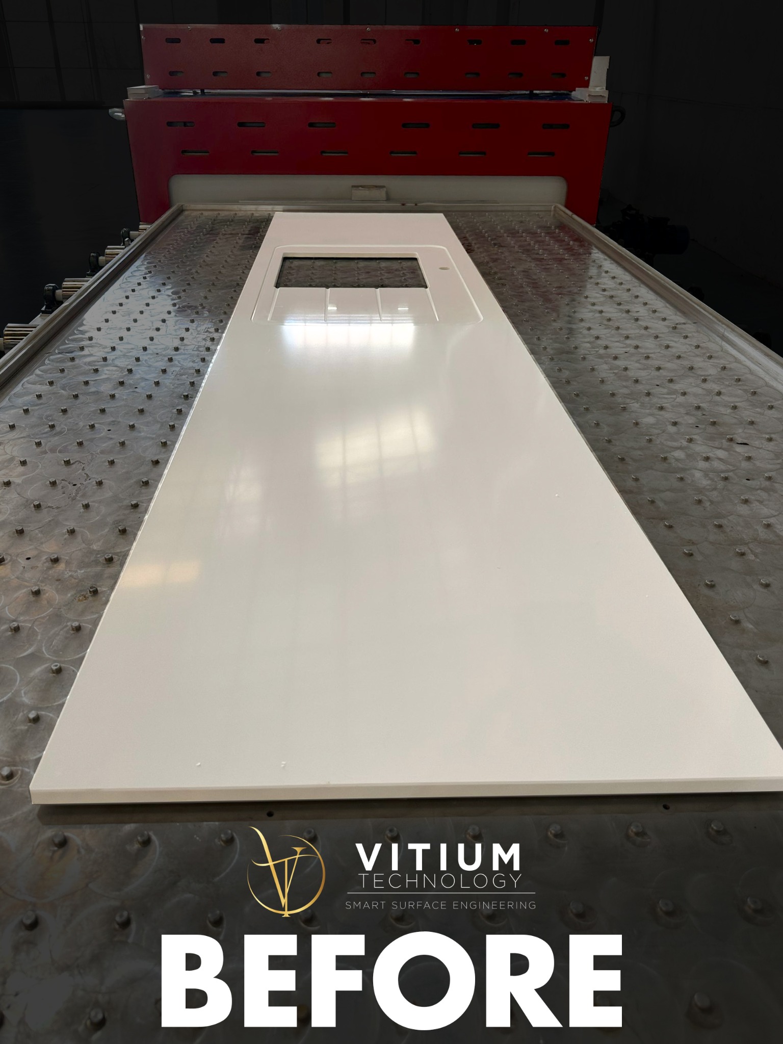 Original before photograph of the white fabricated countertop on the Vitium production table.