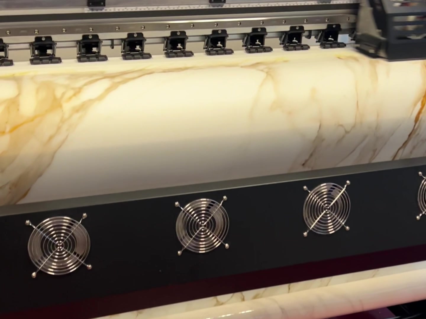 A vein design being printed onto the temporary transfer carrier.