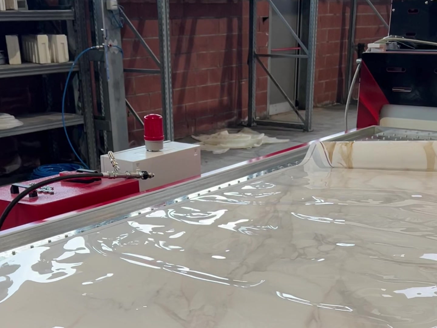 The printed carrier being positioned and aligned on the white countertop.